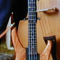 Three bass guitars and an electro-acoustic, ,