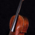 crafted in Italy in ca. 1860 by an unknown luthier. Its lacquer is light red. There's no signature.