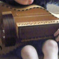 Hurdy Gurdy, flat back with guitar-shaped body made by Richard Smith, in black coffin-shaped case, ,